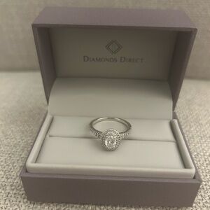 Oval Cut 0.53 Carat Diamonds Direct Engagement Ring